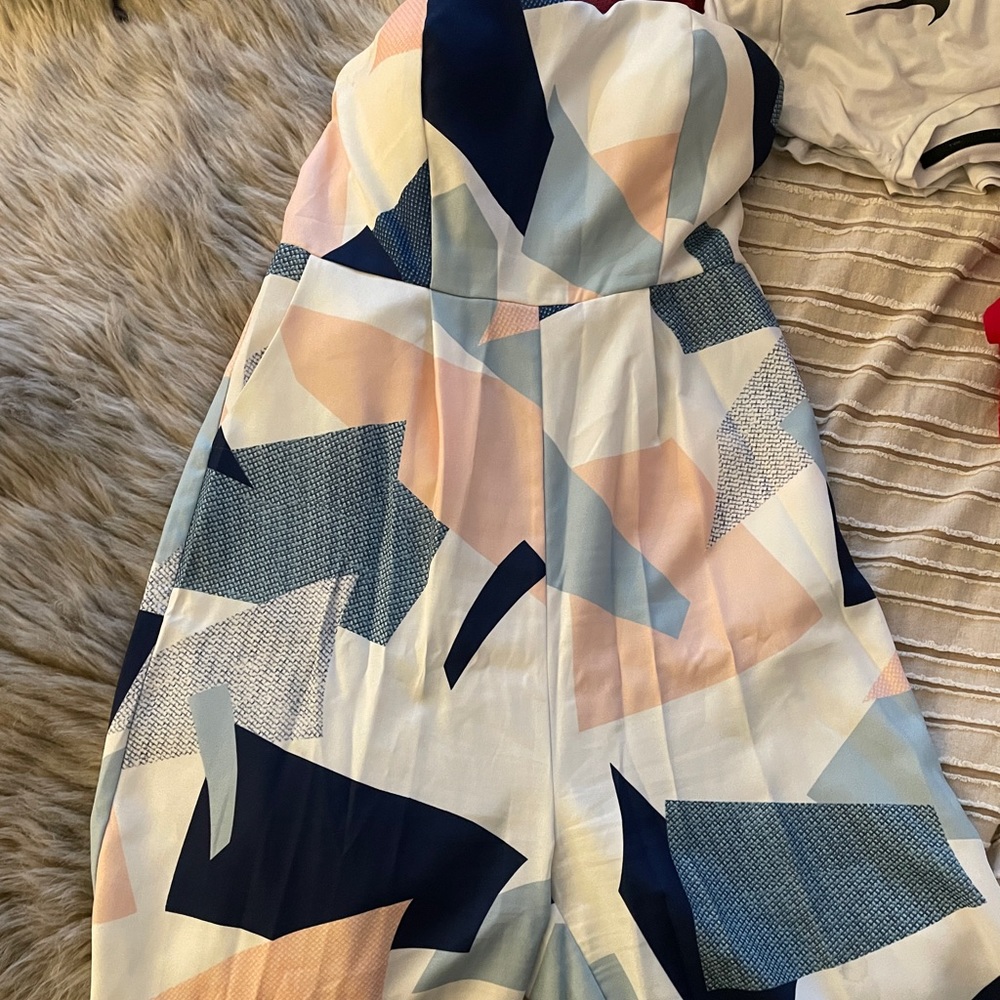 Brand new never worn strapless jumpsuit w tags